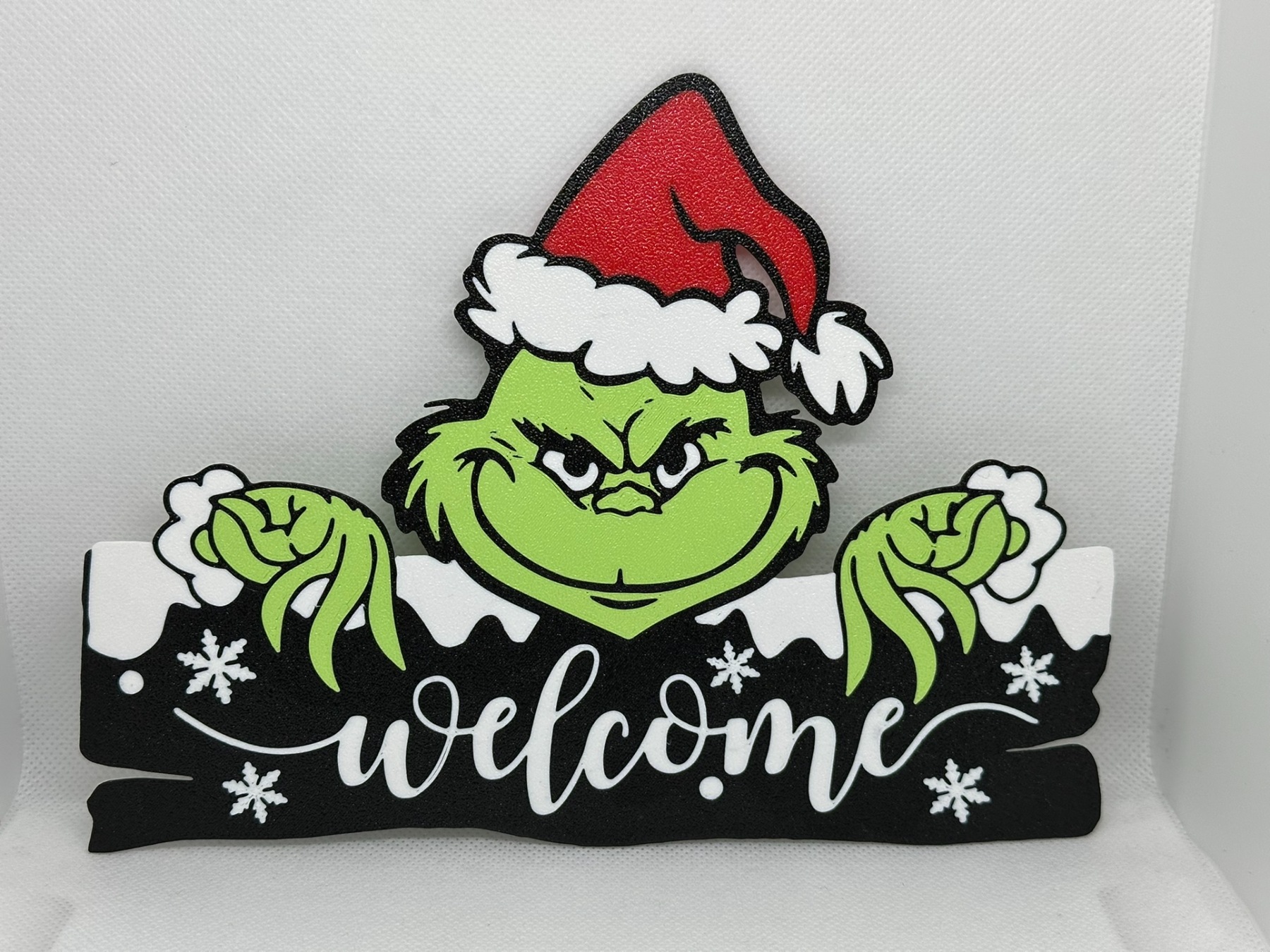 Visuel de référence : Panneau de bienvenue Grinch